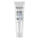 Redken acidic bonding concentrate leave-in treatment tube on a white background