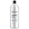 Redken shampoo bottle on a white background