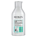 Redken acidic bonding curls conditioner bottle on a white background