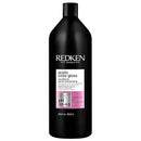 Redken acidic color gloss conditioner bottle on a white background