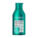 Redken shampoo bottle on a white background