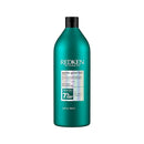 Redken shampoo bottle on a white background