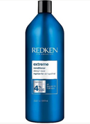 Redken Extreme Conditioner bottle on a white background