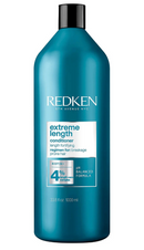 Redken Extreme Length conditioner bottle on a white background