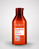 Redken frizz dismiss conditioner bottle on a white background