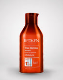 Redken frizz dismiss shampoo bottle on a white background
