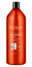 Redken frizz dismiss shampoo bottle on a white background