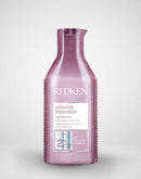 Redken volume injection conditioner bottle on a white background