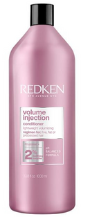 Redken Volume Injection conditioner bottle on a white background