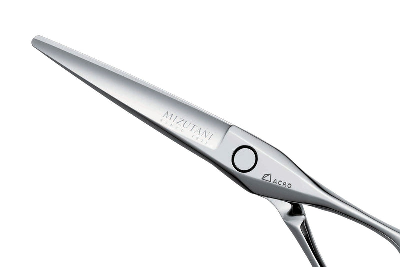 Side view of Mizutani Acro Type K Lefty scissors in silver, demonstrating the precision blade and smooth, sharp edges ideal for detailed cuts.