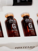 Ion-To Hair & Scalp Science Specialiste G Active Factor Hair Tonic in 20 ml amber glass vials with white caps, arranged in a white box branded HISTEMO.