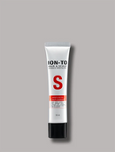 A 35 ml squeeze tube of ION-TO Hair & Scalp Science Specialist Strength Enhancing Scalp Cleanse, featuring a white tube with a bold red 'S' logo and black cap, set against a solid gray background.
