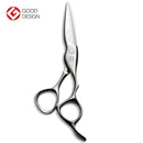 Close-up of Mizutani BLACK-SMITH Fit Puffin scissors in matte black finish, showcasing ergonomic design.