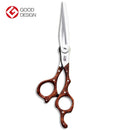 Close-up of the Mizutani SWORD Wood Lefty scissors, emphasizing their handcrafted craftsmanship and sharp, durable edges for precision cutting