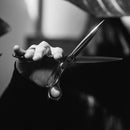 Side view of Mizutani ACRO Crossover CR-1 scissors, highlighting their unique crossover handle style and high-quality craftsmanship for effortless styling.